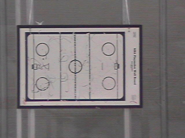The rink whiteboard Herb Brooks left stuck to the glass after his talk