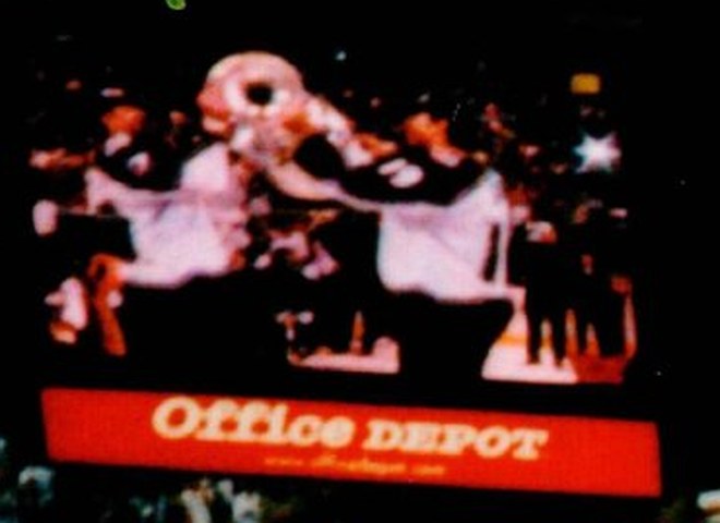 Video screen showing the Stanley Cup being handed over