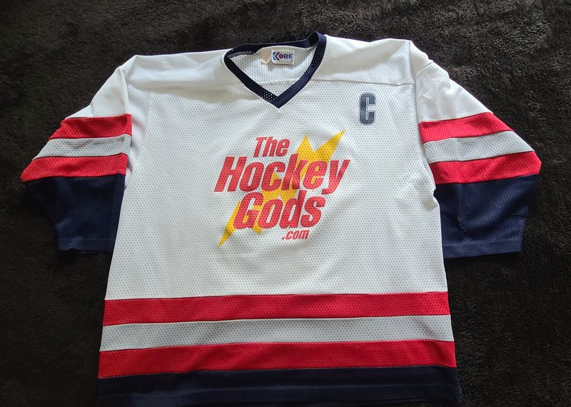 White away Hockey Gods beer league jersey with captain's C
