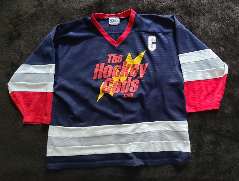 Navy home Hockey Gods beer league jersey with captain's C